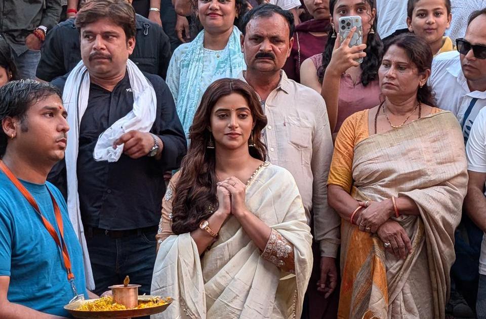 Sanchita Basu prays at the Ganga before a story returns